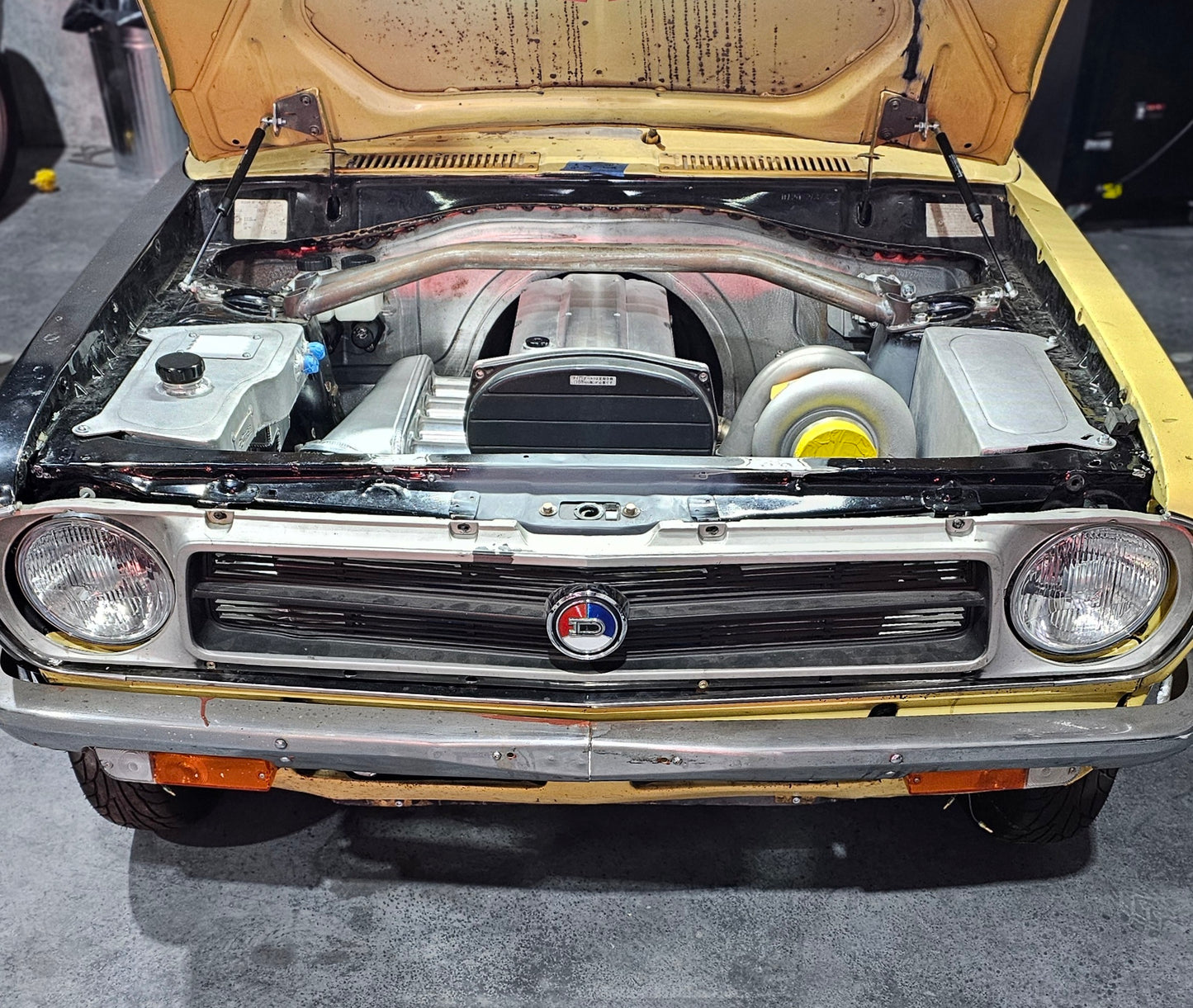 Datsun 1200 bonnet gas strut kit.